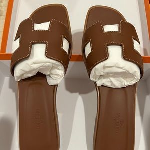 Hermes brand new Oran sandals 7.5 (37.5) Gold